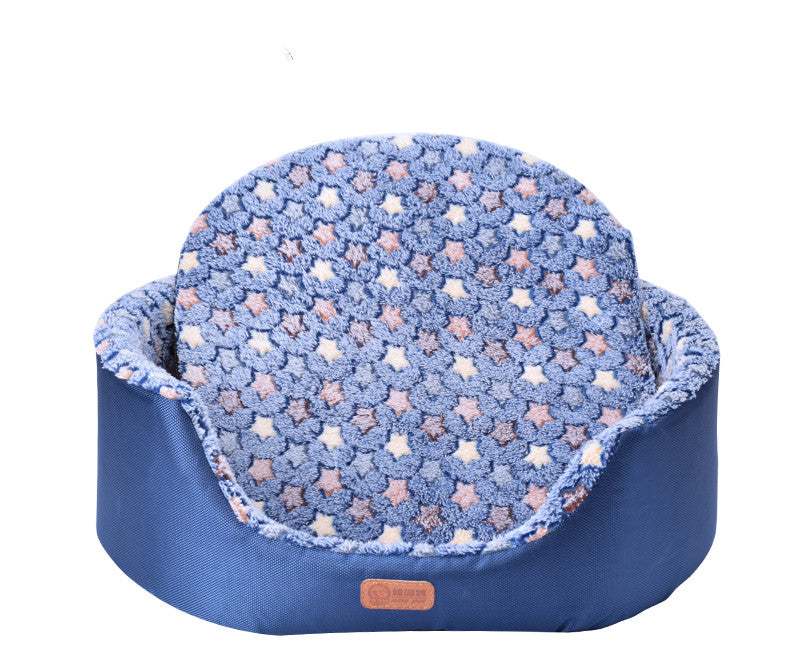 All-Season Dog Bed with a blue fabric base and plush blue star-patterned cushion, featuring raised sides