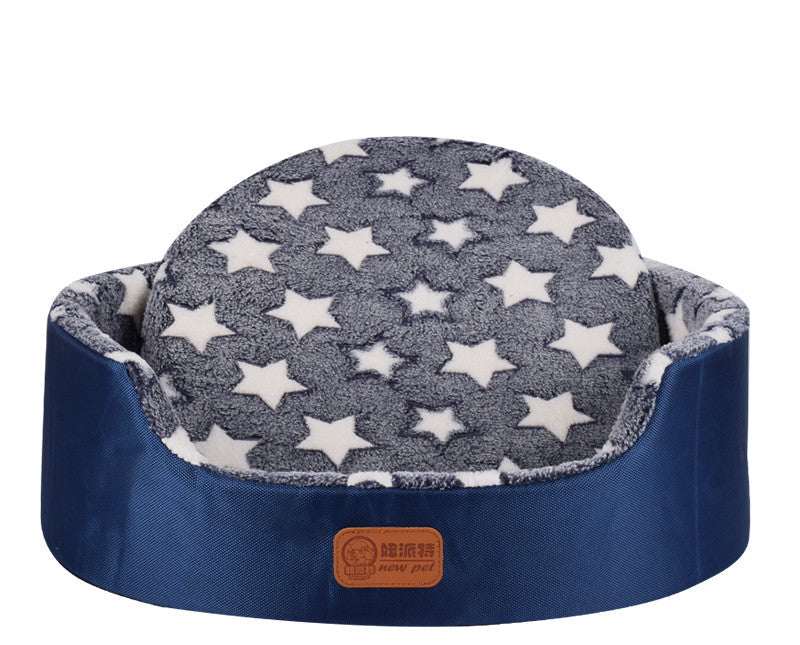 All-Season Dog Bed with a navy blue fabric base and a grey plush cushion patterned with white stars