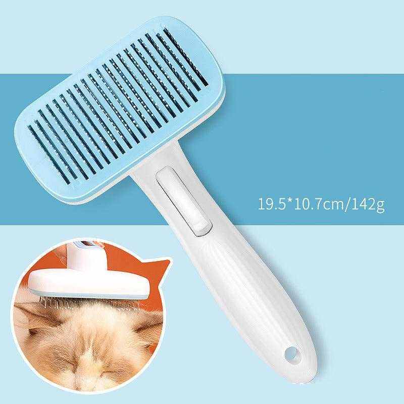 Automatic Pet Grooming Comb with a pale blue rectangular head, fine metal bristles and a white handle with a button