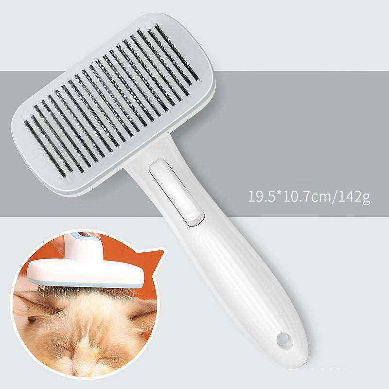 Automatic Pet Grooming Comb with a white plastic handle, silver grooming pins, and a rectangular brush head with a release button