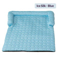 Bed Pet Cooling Mat in ice silk blue with a raised cushioned border and repeating circular quilted pattern