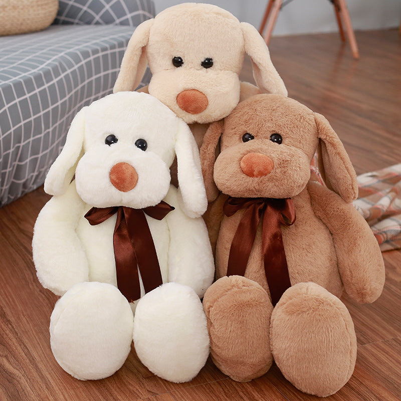 Cute Dull Dog Doll plush toys in cream and brown short plush, with floppy ears, round noses and satin bows