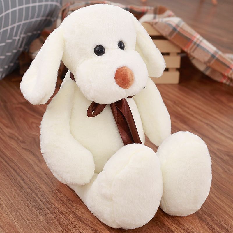 Cute Dull Dog Doll is a white short-plush dog with floppy ears, a brown nose, and a dark brown ribbon