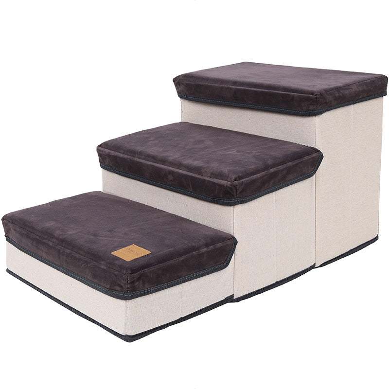 Foldable Storage Pet stairs with three cream fabric storage steps, dark brown flannel cushions and a small tan label