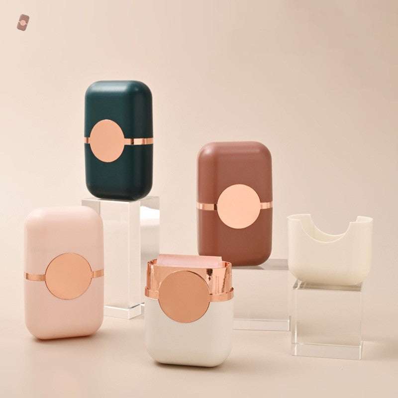 Pet Hair Double Headed lint roller in dark green and blush pink with a rose-gold band and circular accent