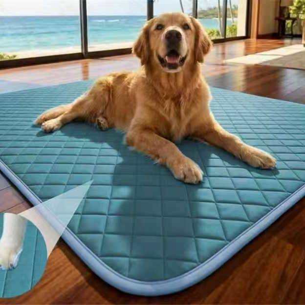 Pet Ice-Silk Non-Slip Cooling Mat in blue with a quilted diamond pattern and a golden retriever resting on it