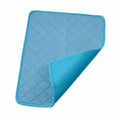 Pet Ice-Silk Non-Slip Cooling Mat in blue polyester, with diamond quilting, bound edges and a textured underside