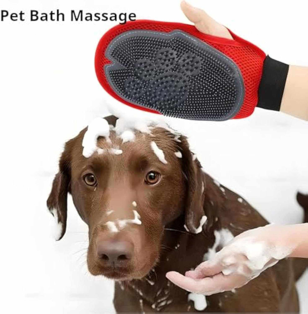 Pet Wash & Hair Removal Mitt with red mesh backing and black textured silicone bristles massaging a soapy brown dog