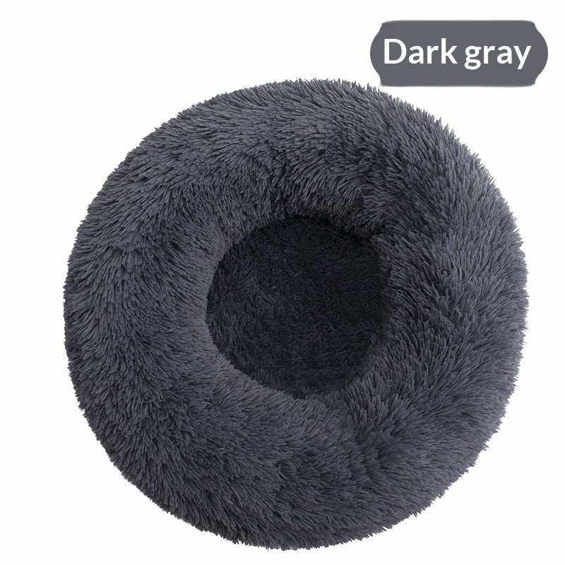 Removable And Washable Dog Bed in dark gray plush, with a round donut shape, raised furry rim and recessed center
