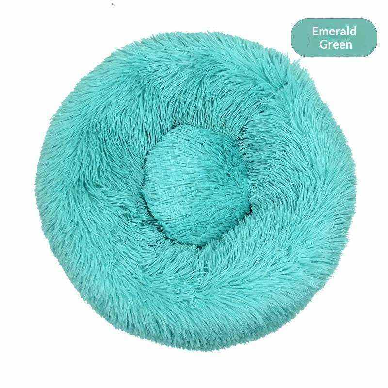 Removable And Washable Dog Bed in emerald green plush, round and shaggy with a raised circular center cushion.