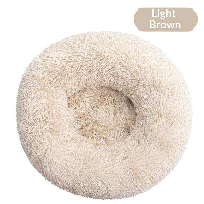 Removable And Washable Dog Bed in light brown plush, with a round, shaggy surface and raised cushioned rim