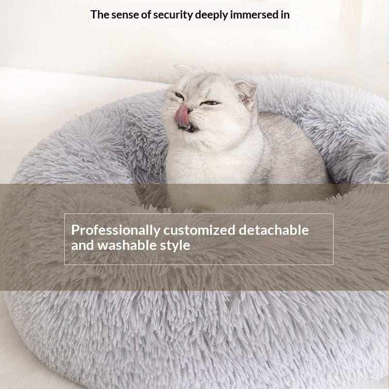 Removable And Washable Dog Bed, round light gray plush nest bed with deep shaggy raised sides, cradling a white cat