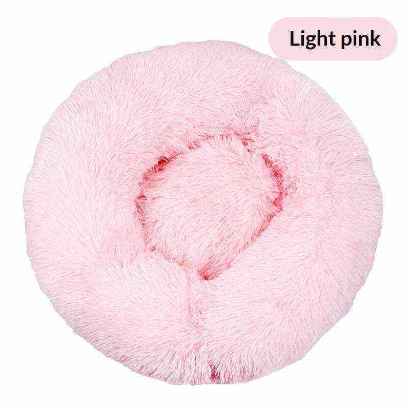 Removable And Washable Dog Bed in light pink plush with a round shape, raised cushioned rim, and center cushion