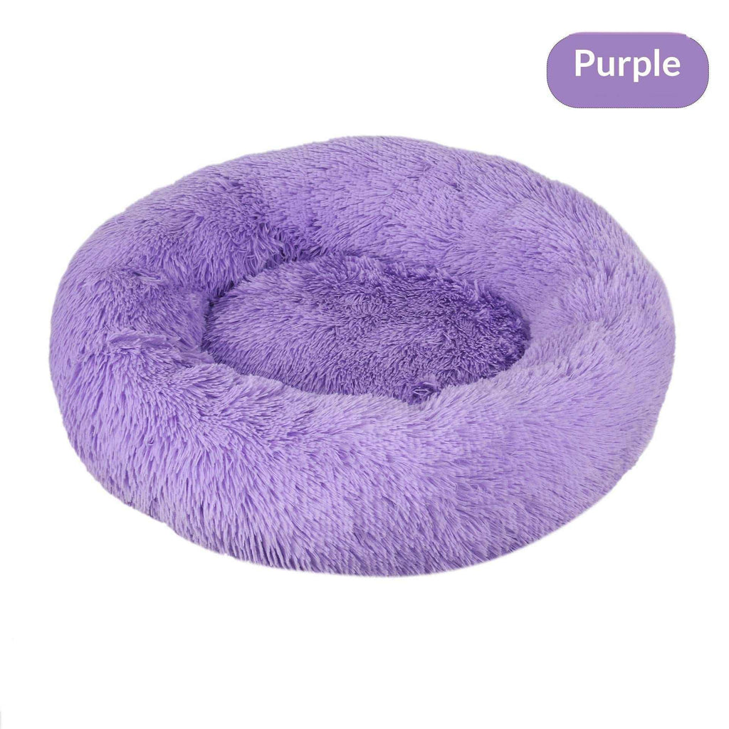 Removable And Washable Dog Bed in lavender-purple plush, featuring a round raised bolster rim and cushioned center.