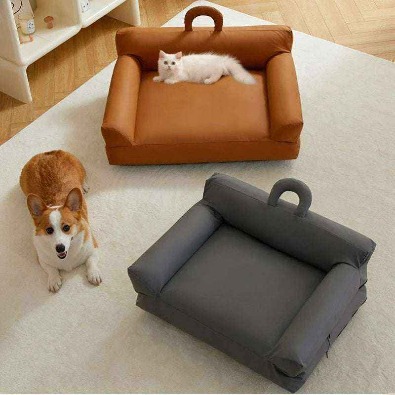 Removable & Washable Pet Bed in brown and charcoal fabric, with raised cushioned sides and a carry handle; cats and dogs shown