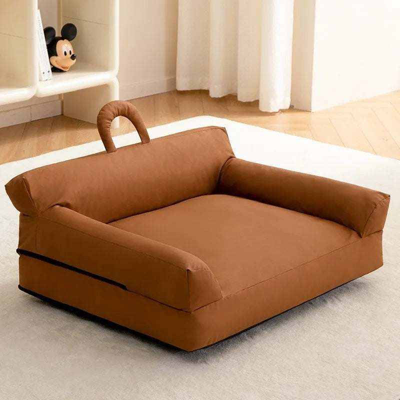 Removable & Washable Pet Bed in warm brown fabric, with raised padded sides, a cushioned base and carry loop